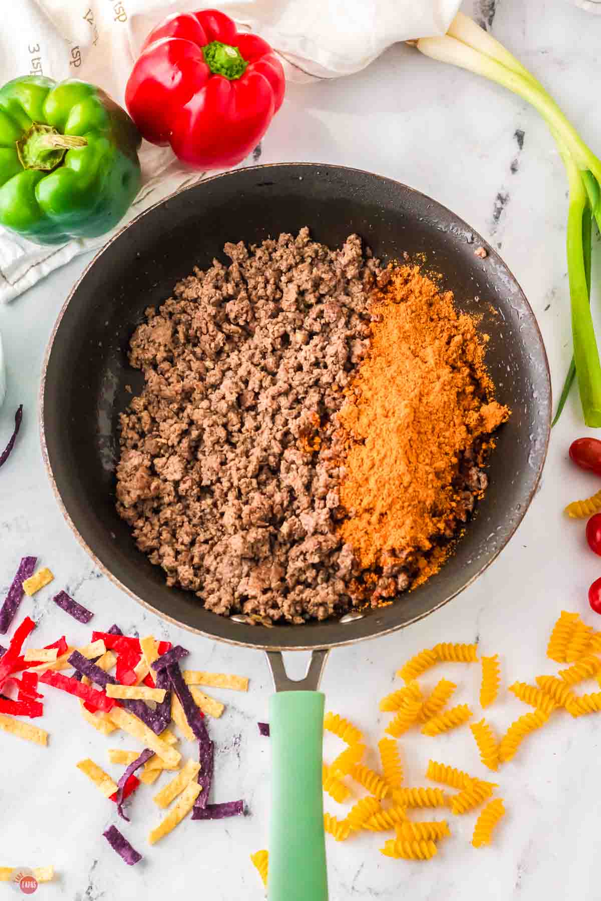 ground beef and taco seasoning in a skillet