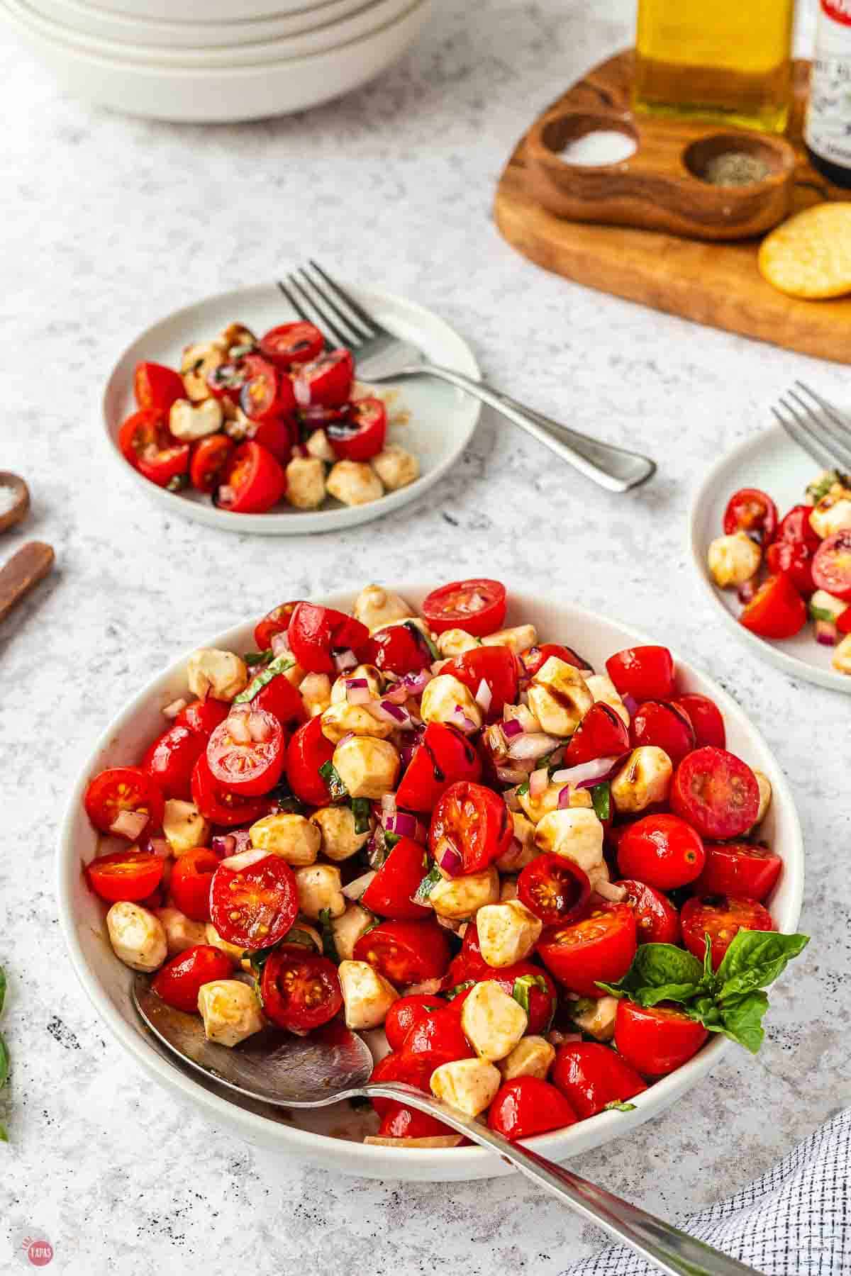 three bowls of tomatoes