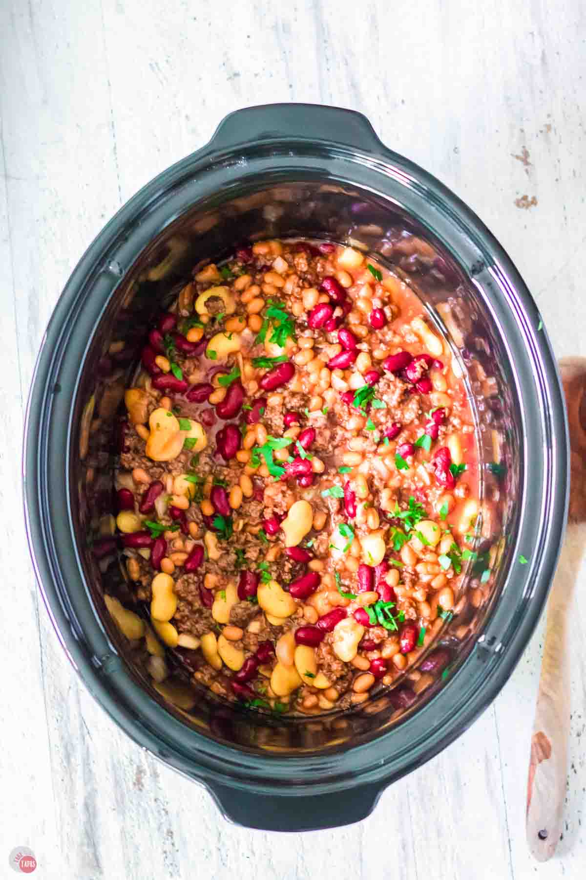 crockpot bowl full of meat and beans