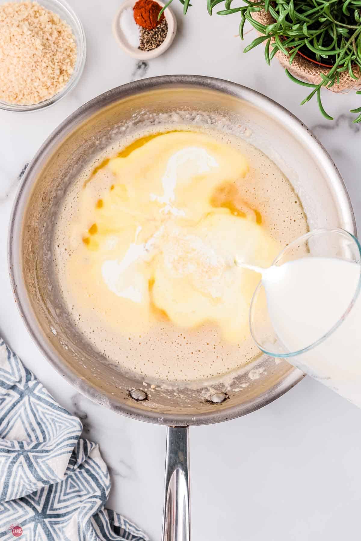 saucepan filled with cream and spices
