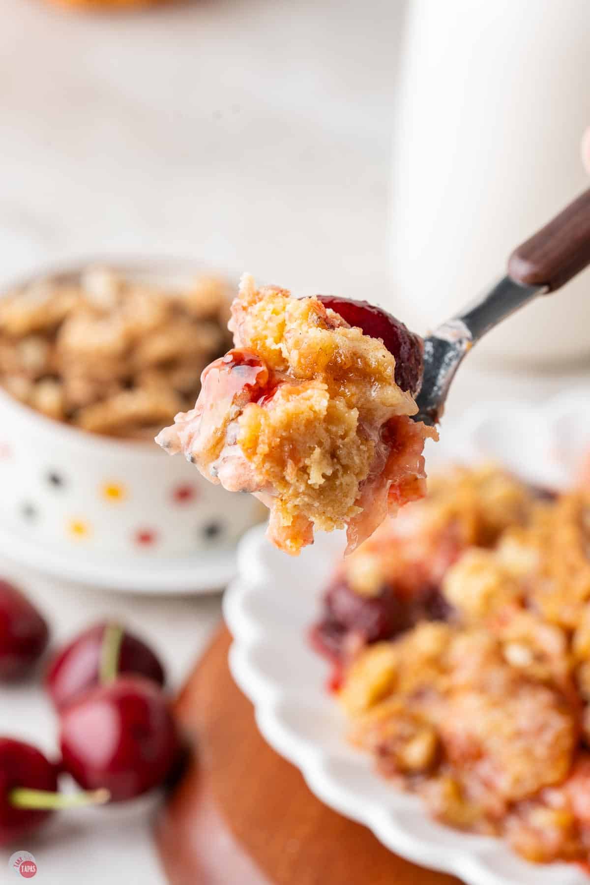 fork with a bite of dump cake on it