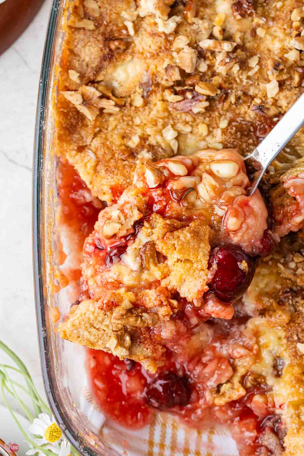 dump cake with a scoop missing