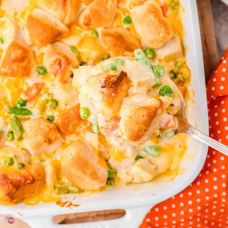 spoon scooping chicken casserole out of a dish
