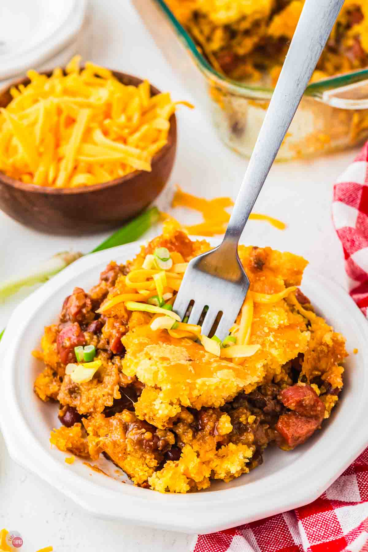 plate of chili dog casserole with a fork in it
