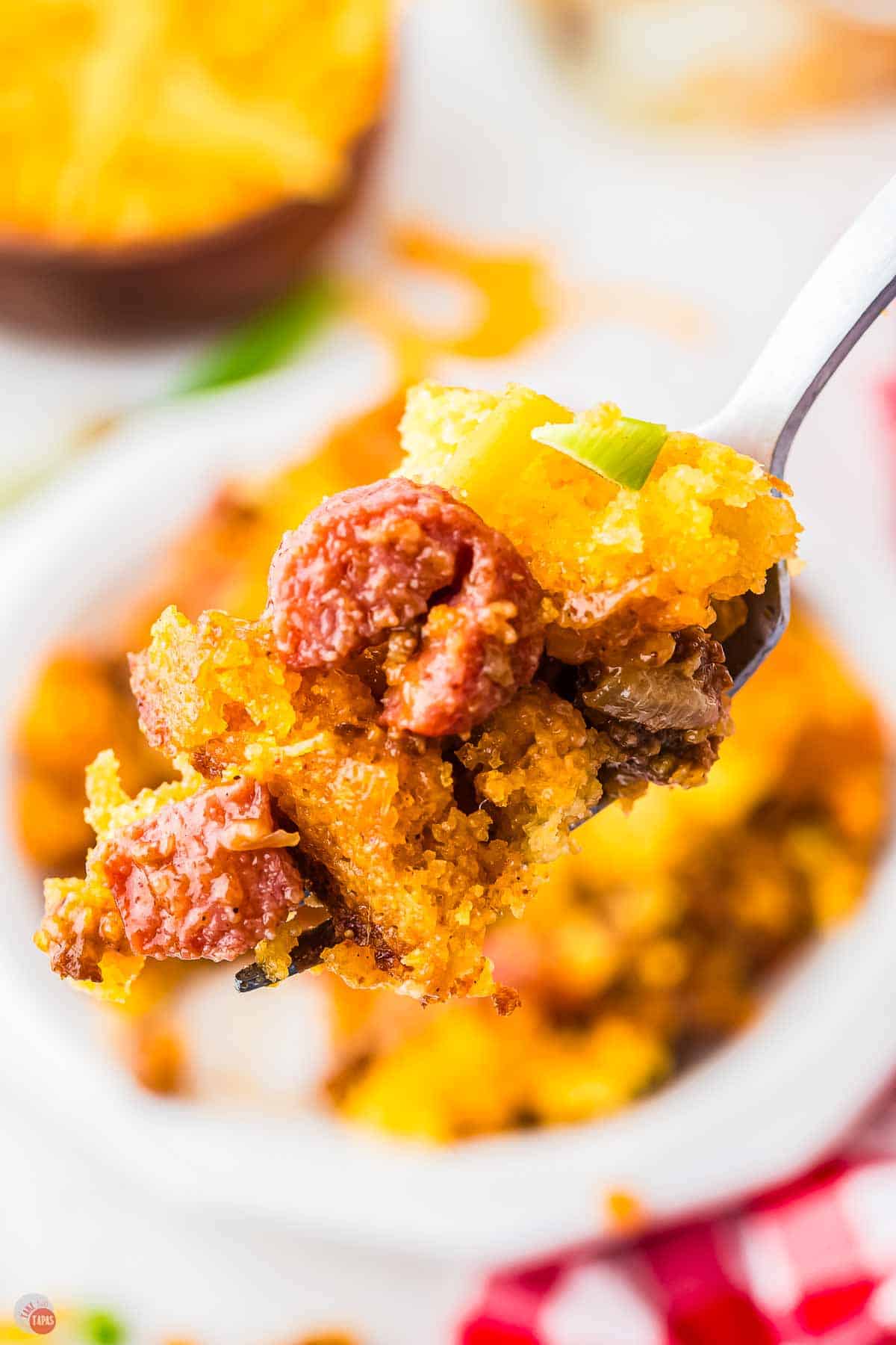 fork with bite of chili dog casserole