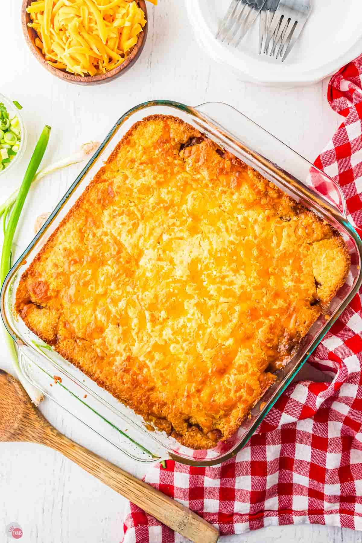 baked chili dog casserole on a checkered napkin