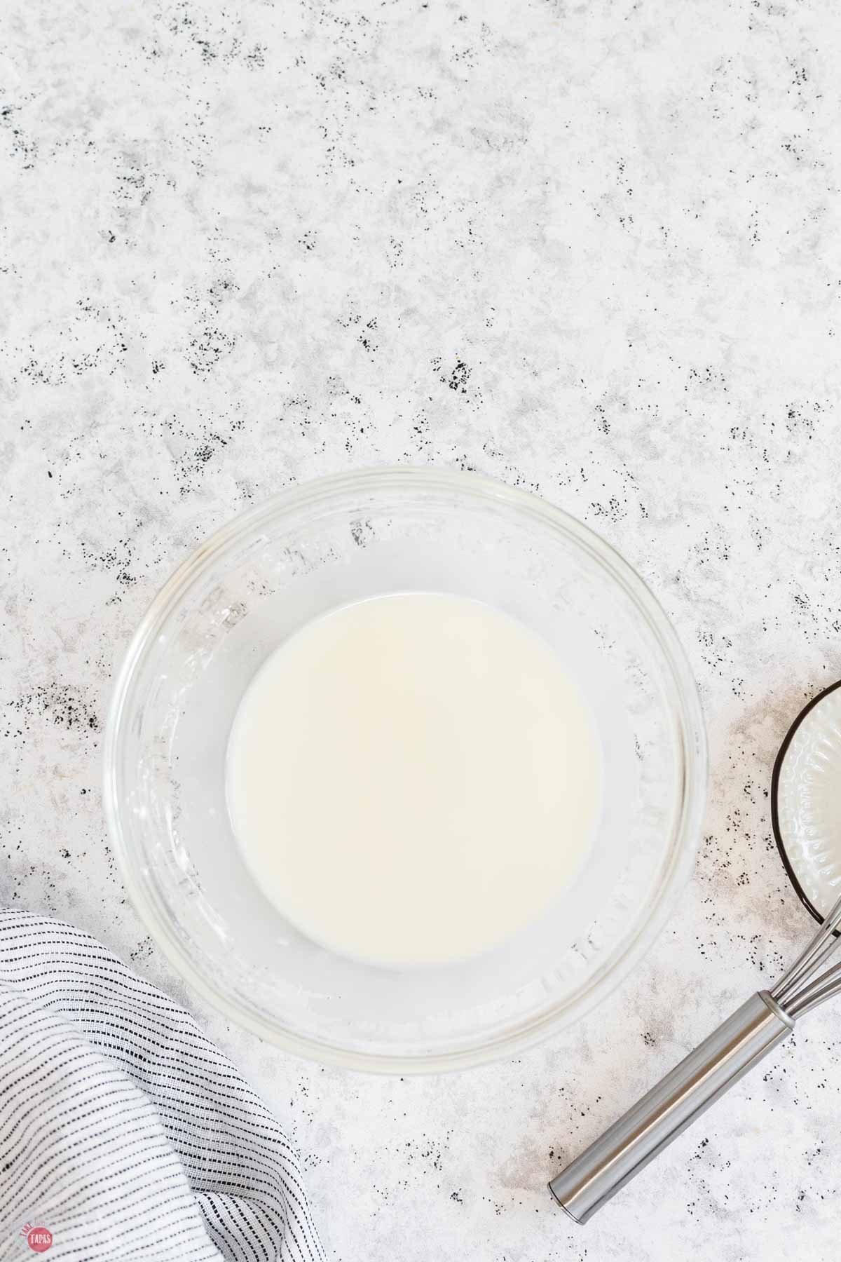 clear bowl with a cornstarch slurry in it