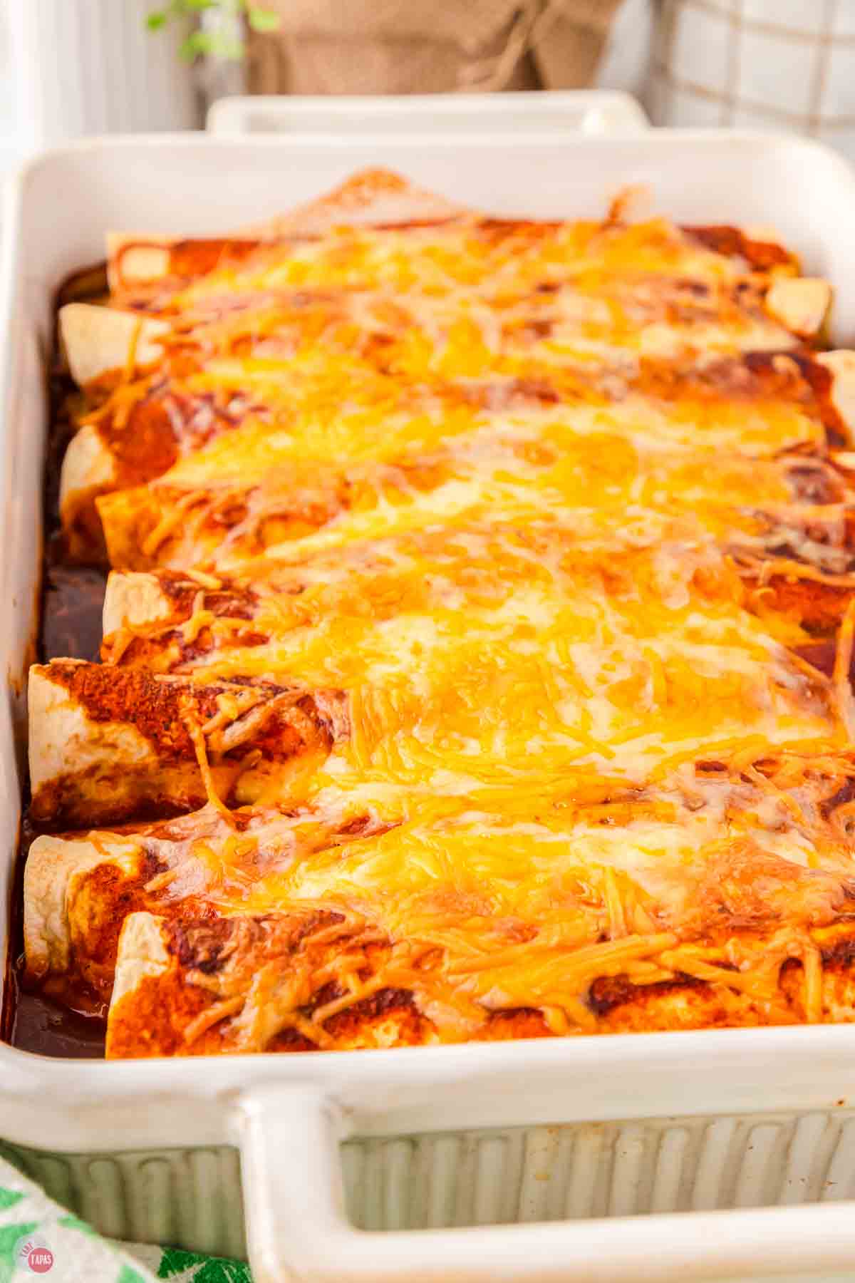 white baking dish filled with mexican food