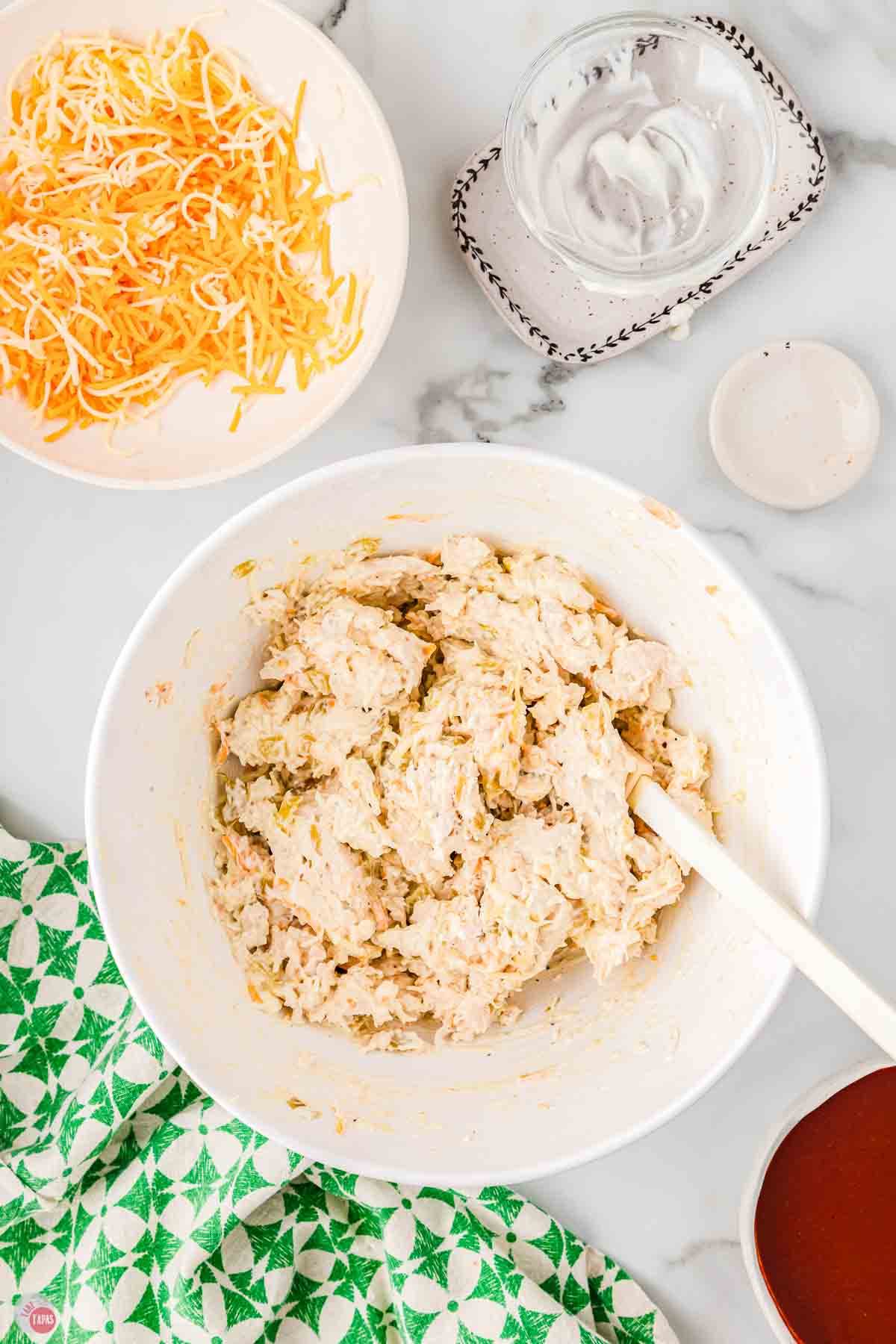 chicken enchilada mixture in a white bowl