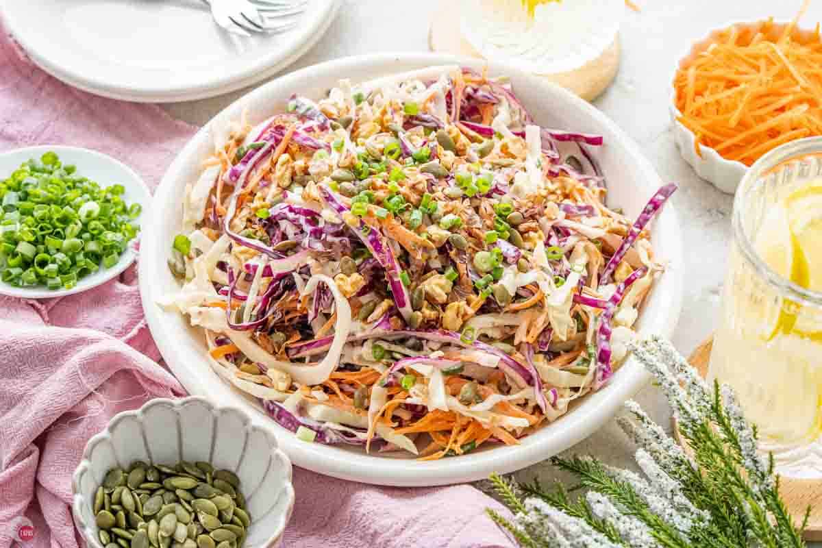 bowl of fresh coleslaw with a spoon