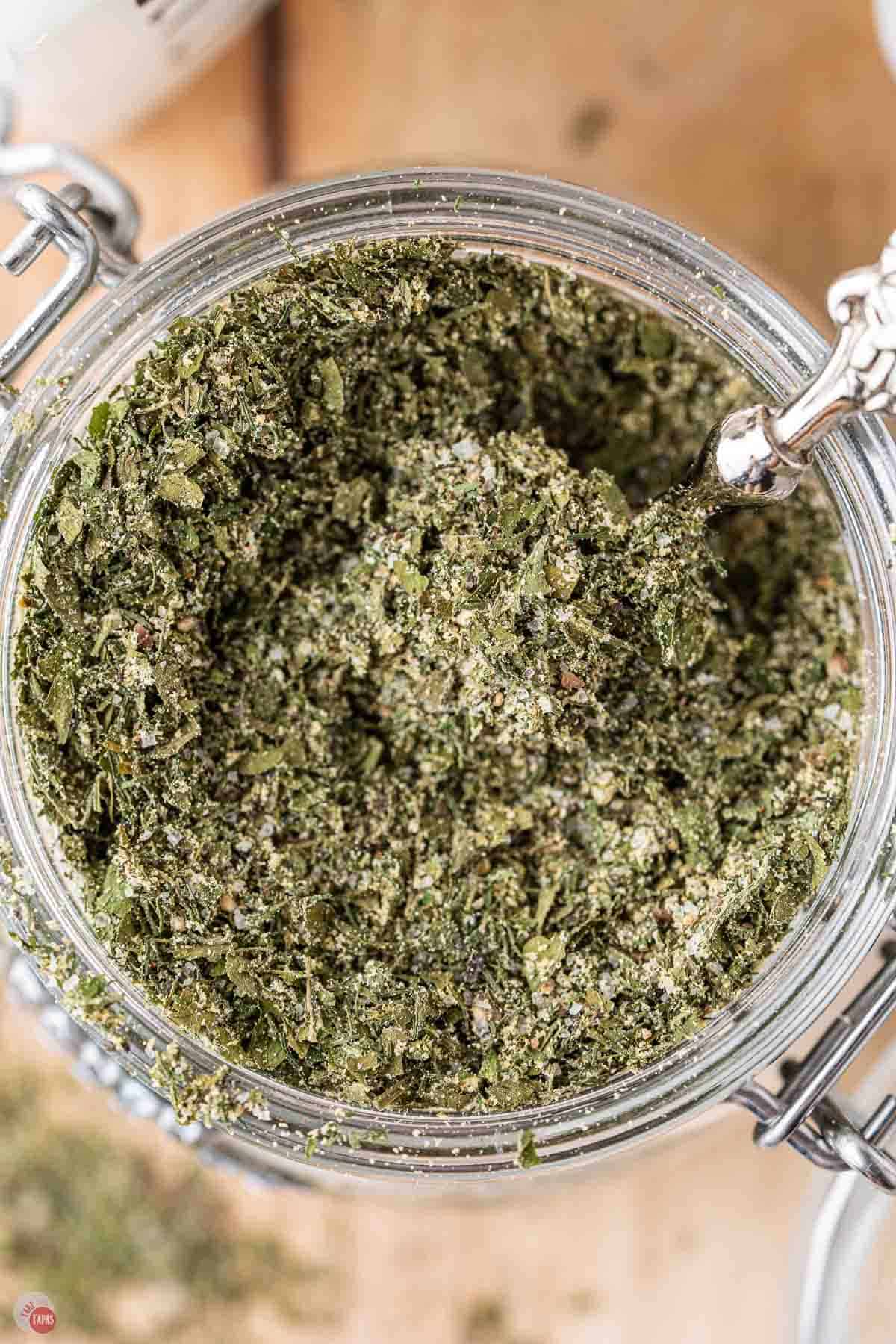 overhead jar of ranch spices with a silver spoon