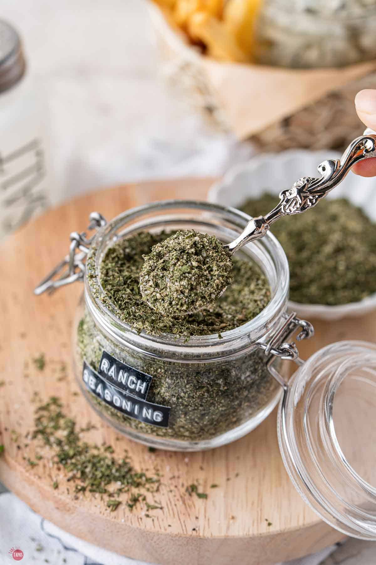 jar of homemade ranch seasoning with a spoon