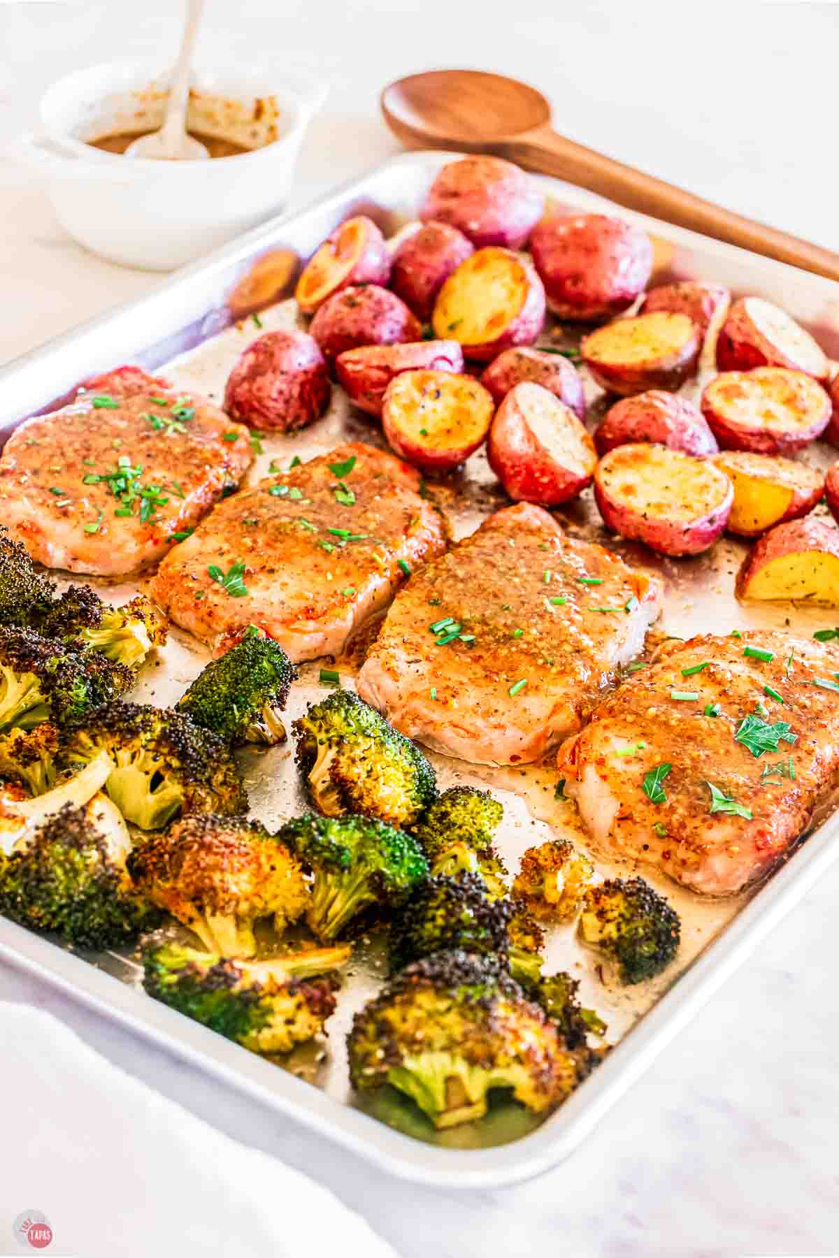 close up of pork chop sheet pan meal