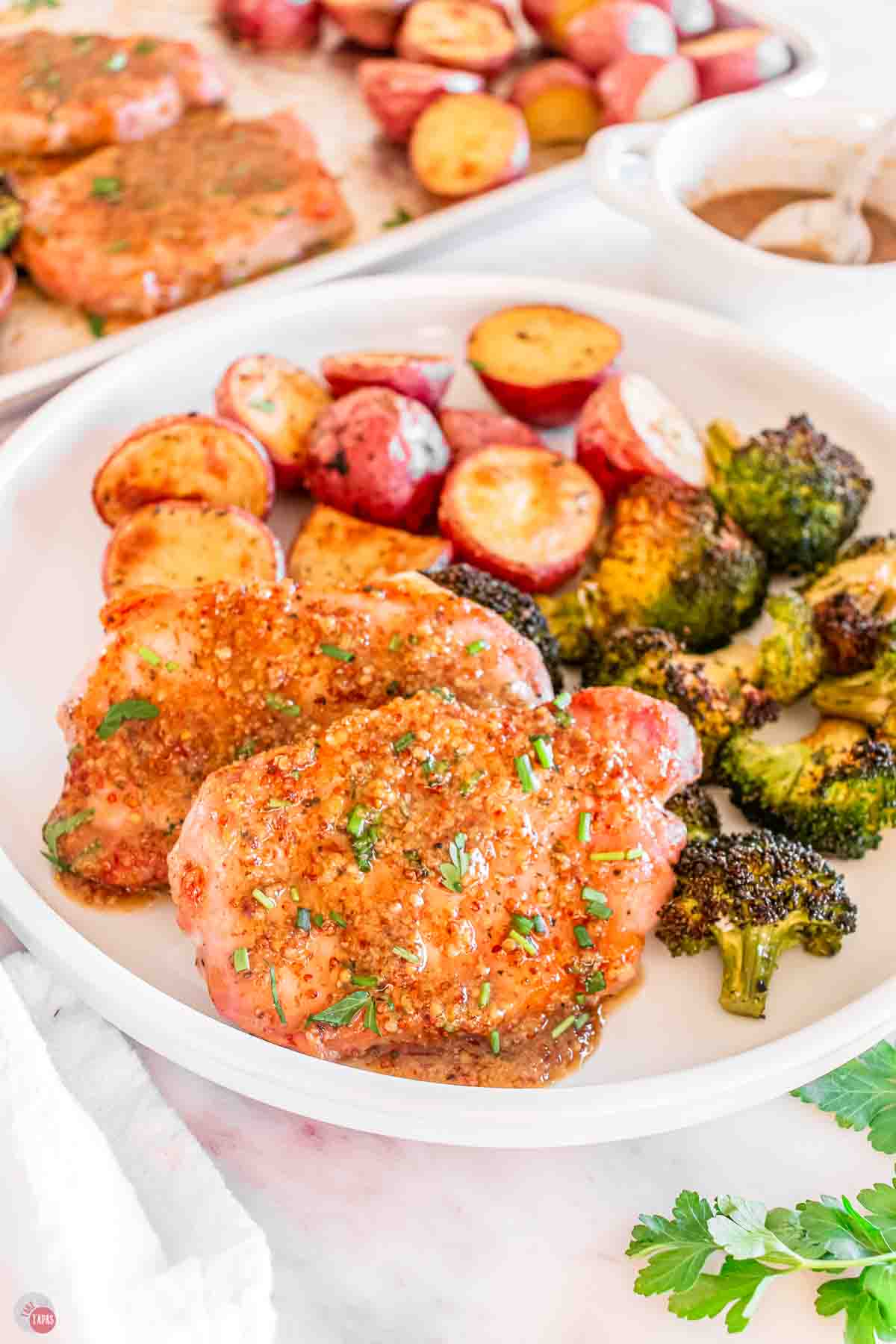 pork chops and vegetables on a plate