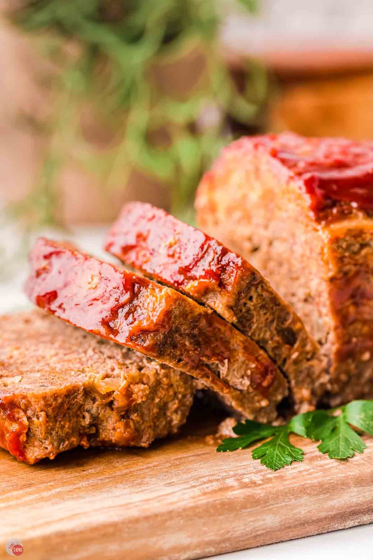 side view of meatloaf with a few slices cut off the end