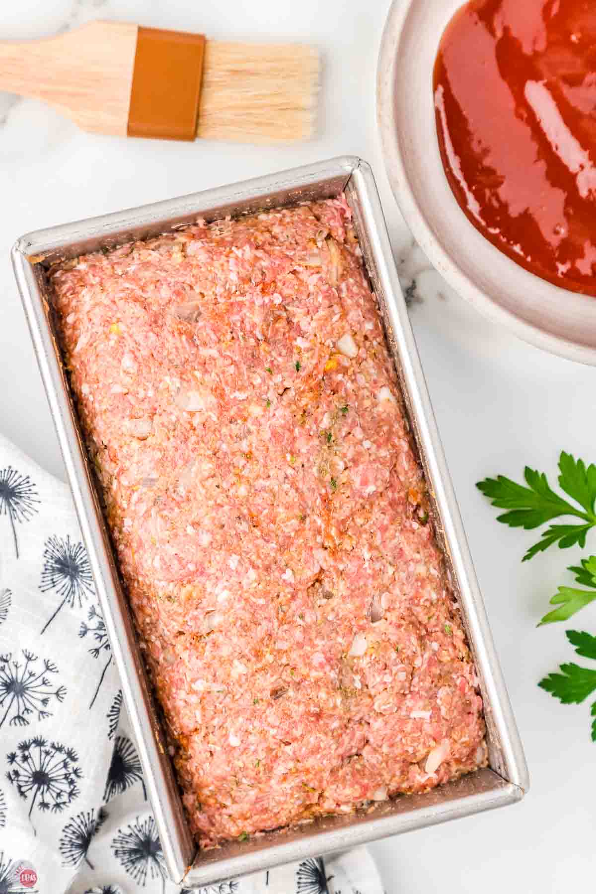 unbaked meatloaf in a loaf pan