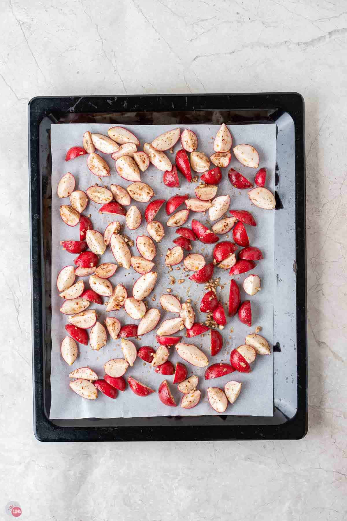 sheet pan of diced radishes