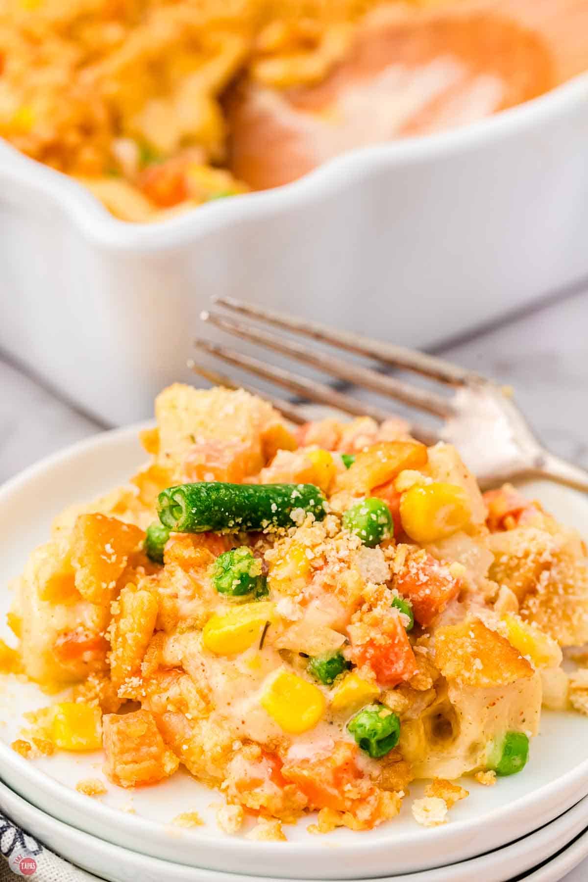 plate with scoop of casserole with a fork