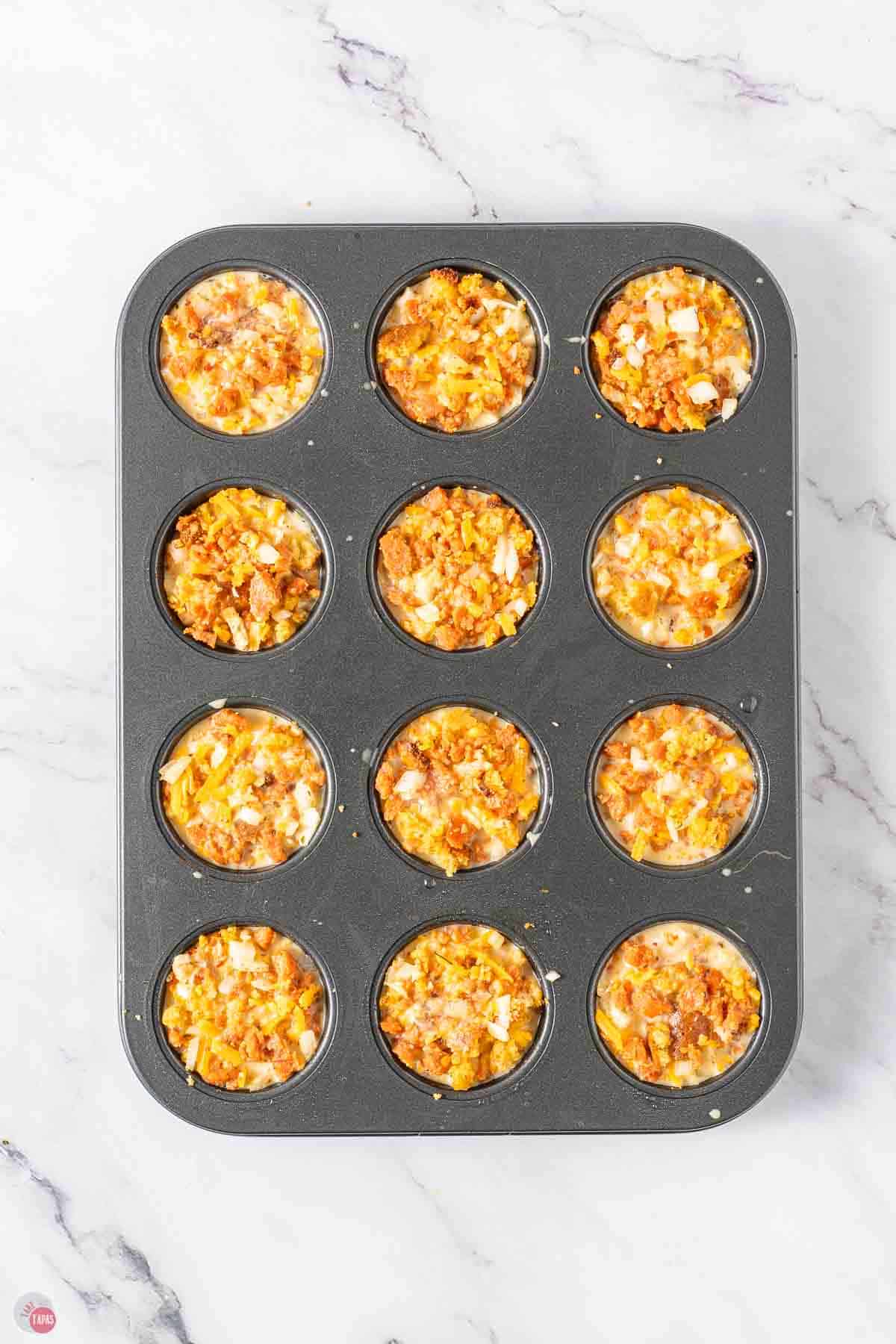 mini casserole muffins with egg mixture in a muffin pan