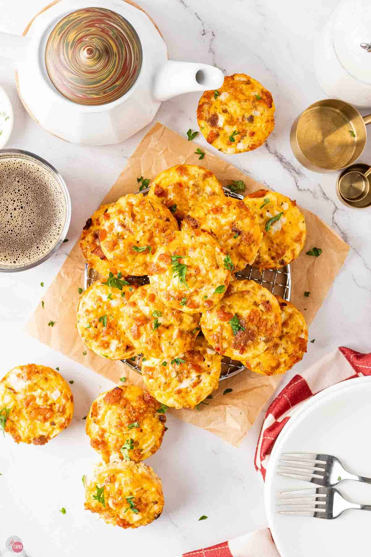 overhead picture of breakfast casserole muffins on a piece of parchment paper