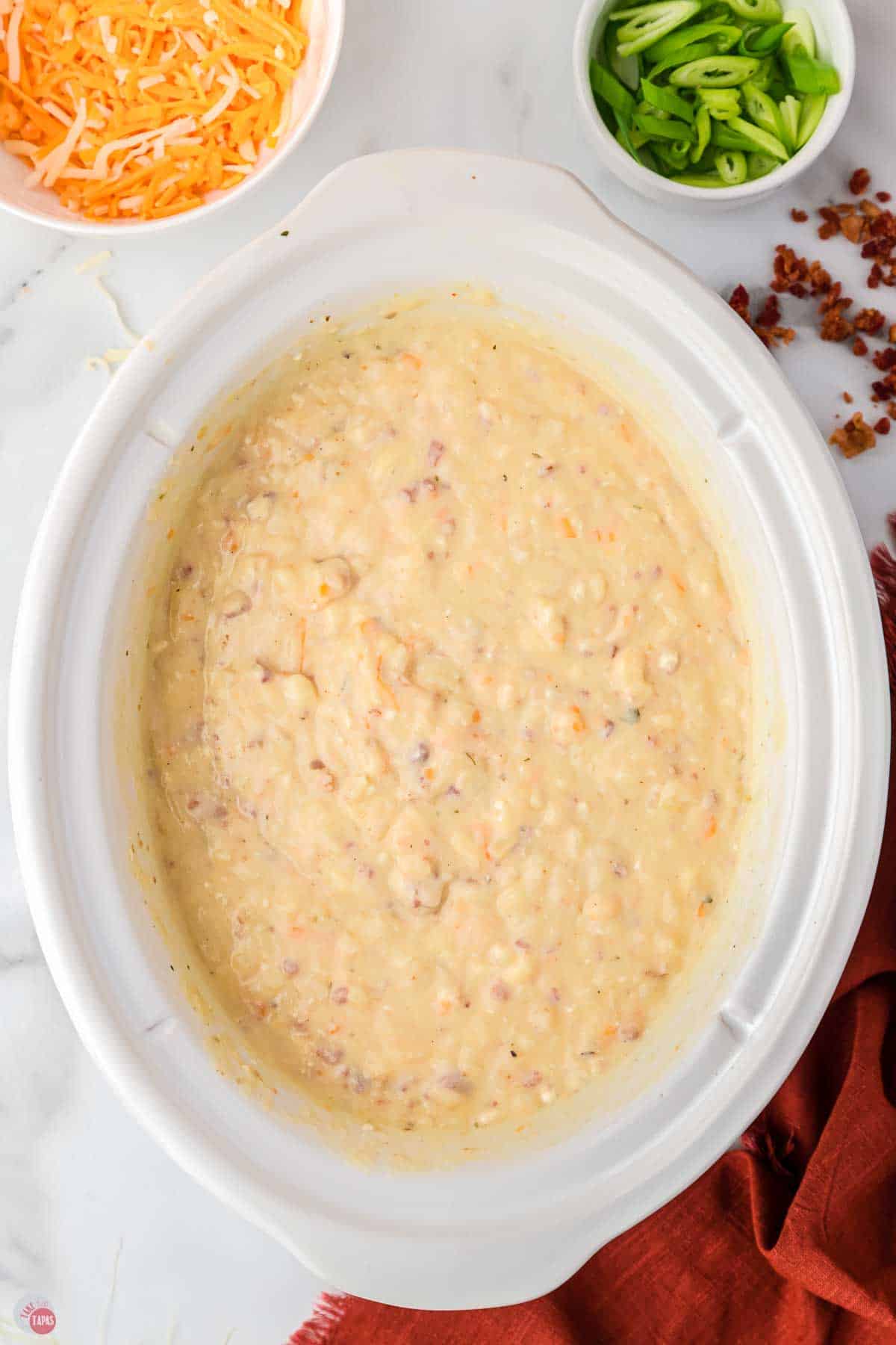 slow cooker full of potato soup