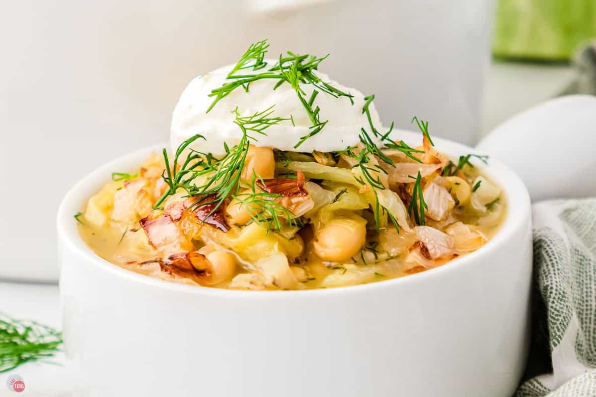 side view of soup in a small white bowl