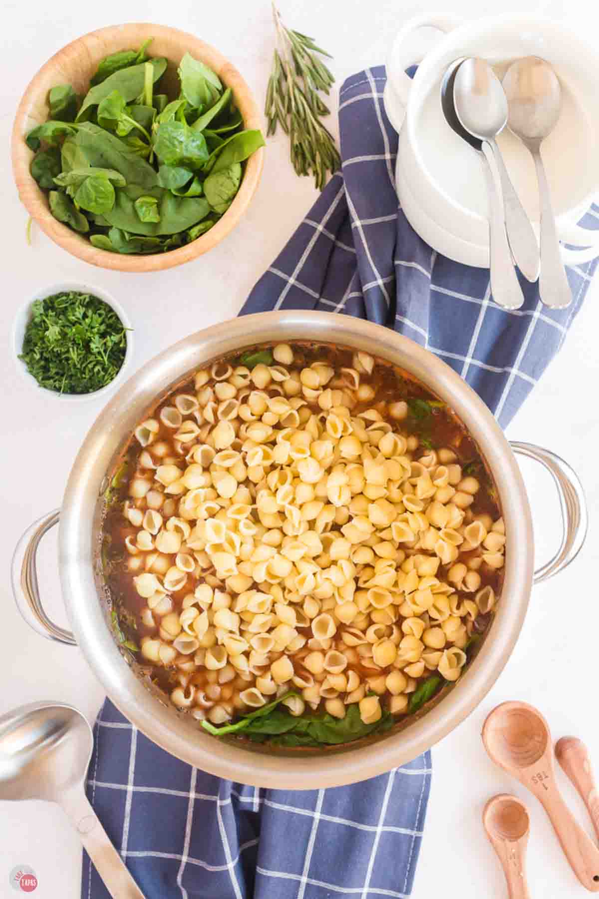 soup pot with cooked pasta shells just added
