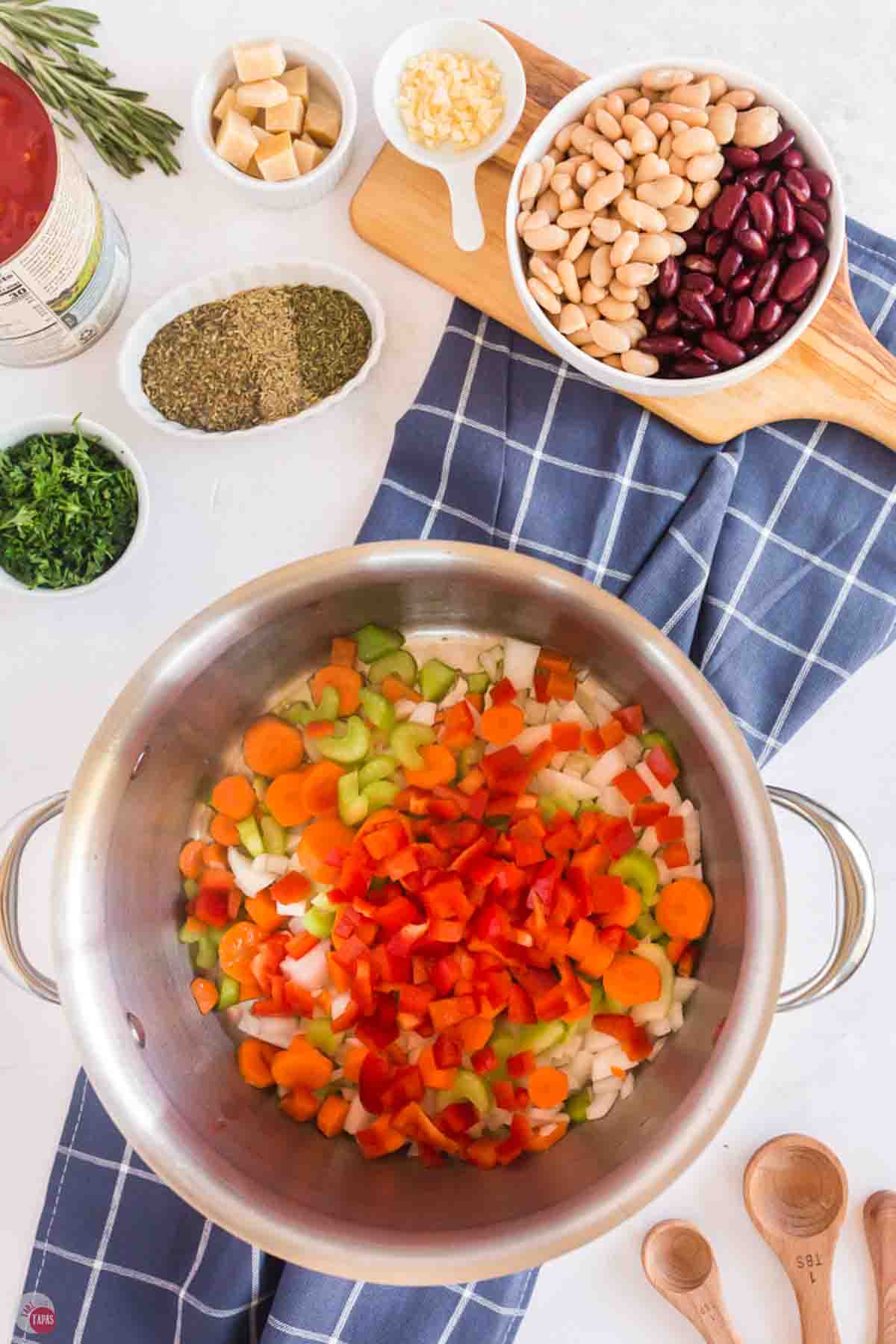 raw vegetables in a silver pot