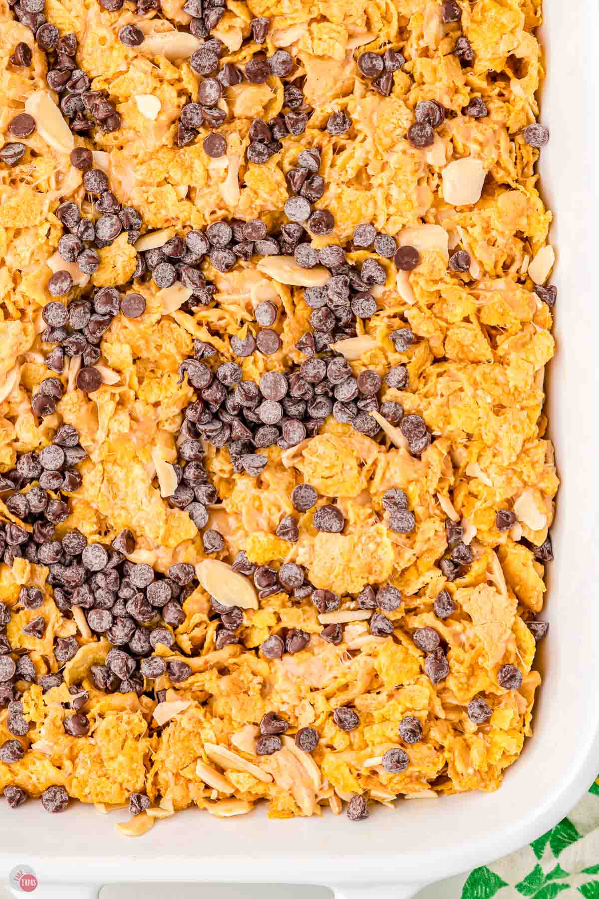 close up of cornflake bars with topped with chocolate chips