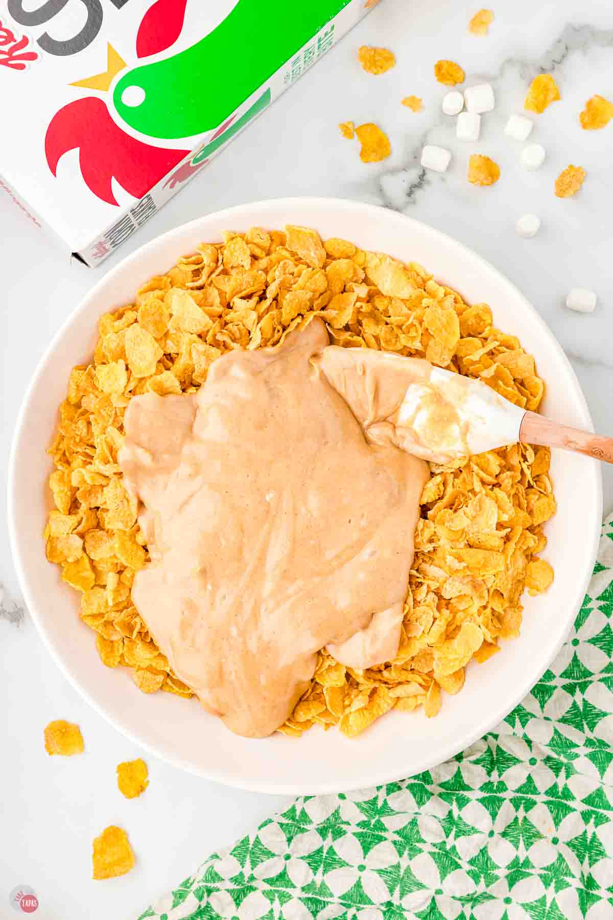 large bowl of cornflakes topped with a peanut butter marshmallow cream