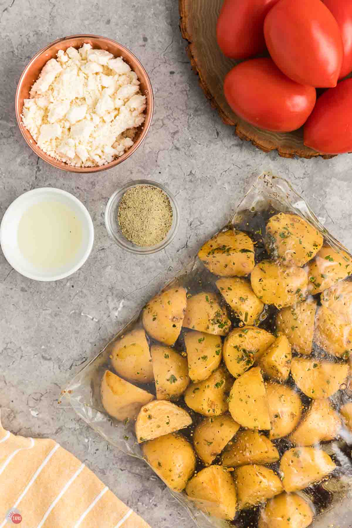 diced baby potatoes marinating in a plastic bag