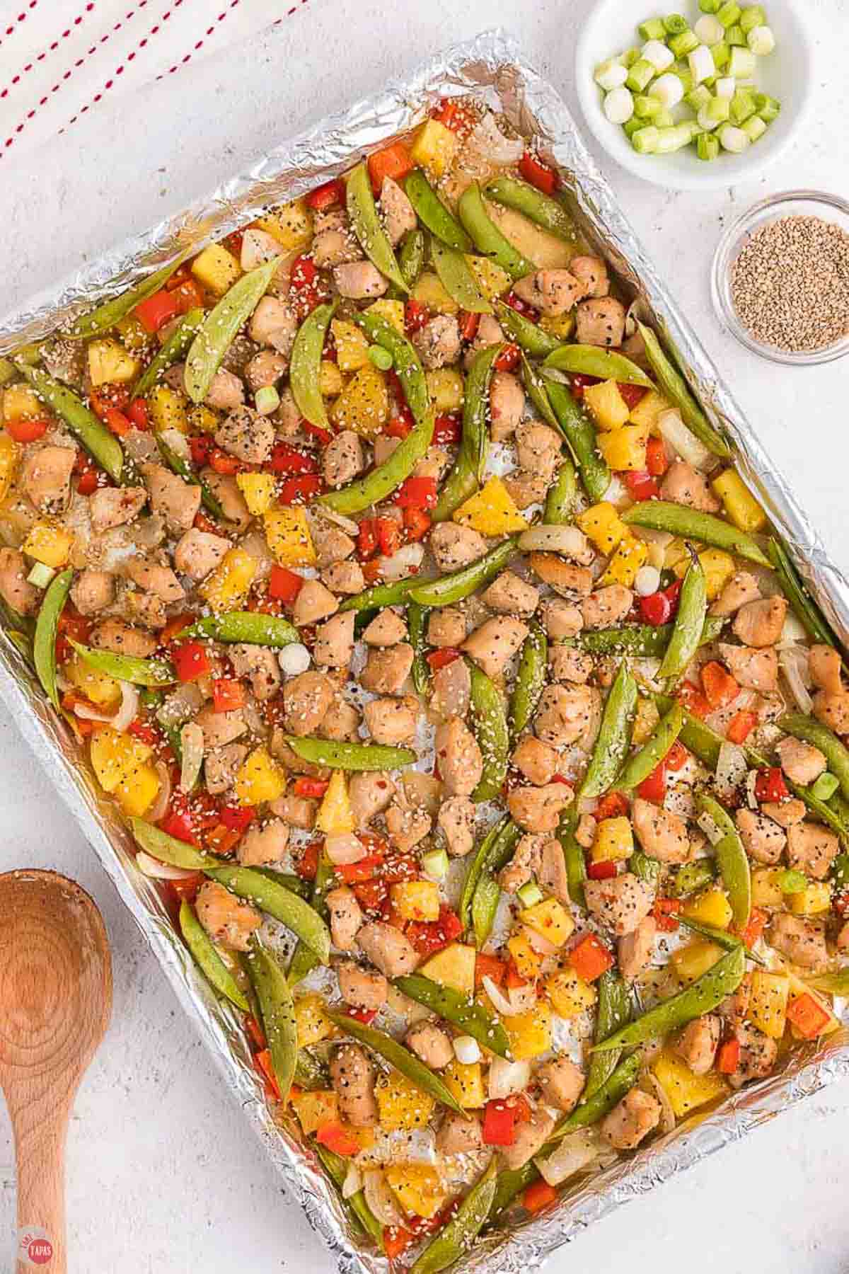 baking sheet with chicken and vegetables