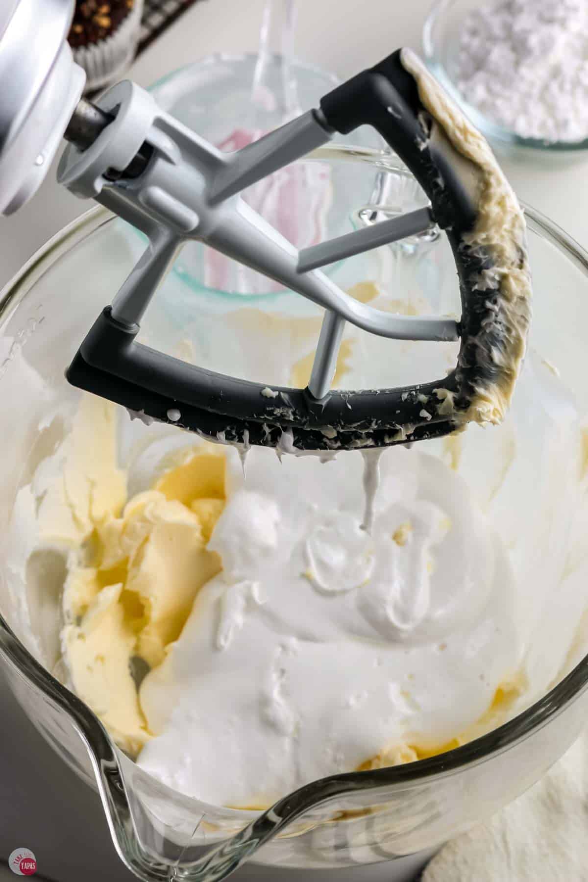 creamed butter and marshmallow fluff in a mixing bowl