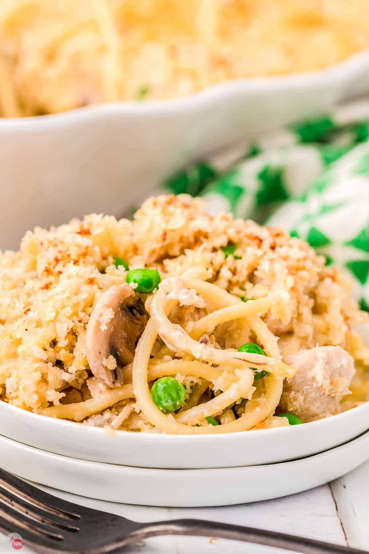 close up of plate of tuna tetrazzini casserole with peas and mushrooms