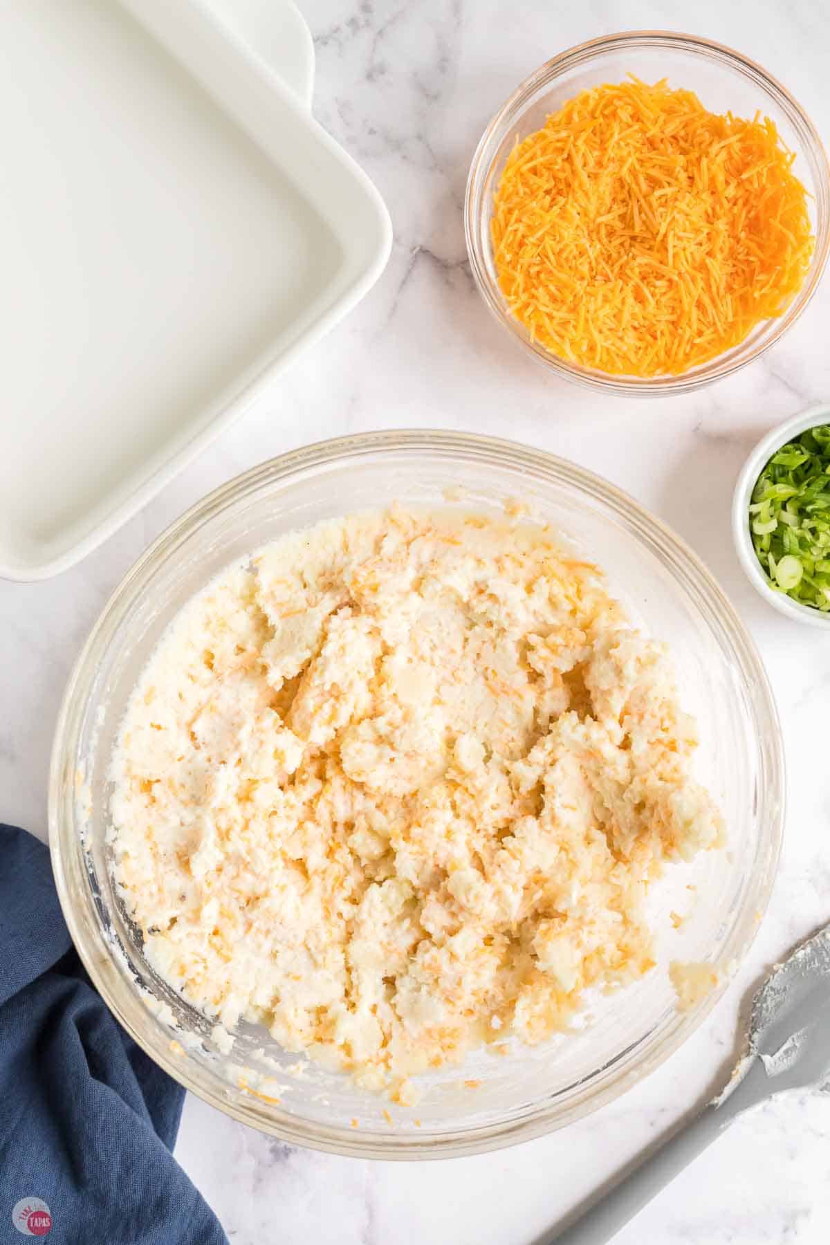mashed potato mixture in a clear mixing bowl