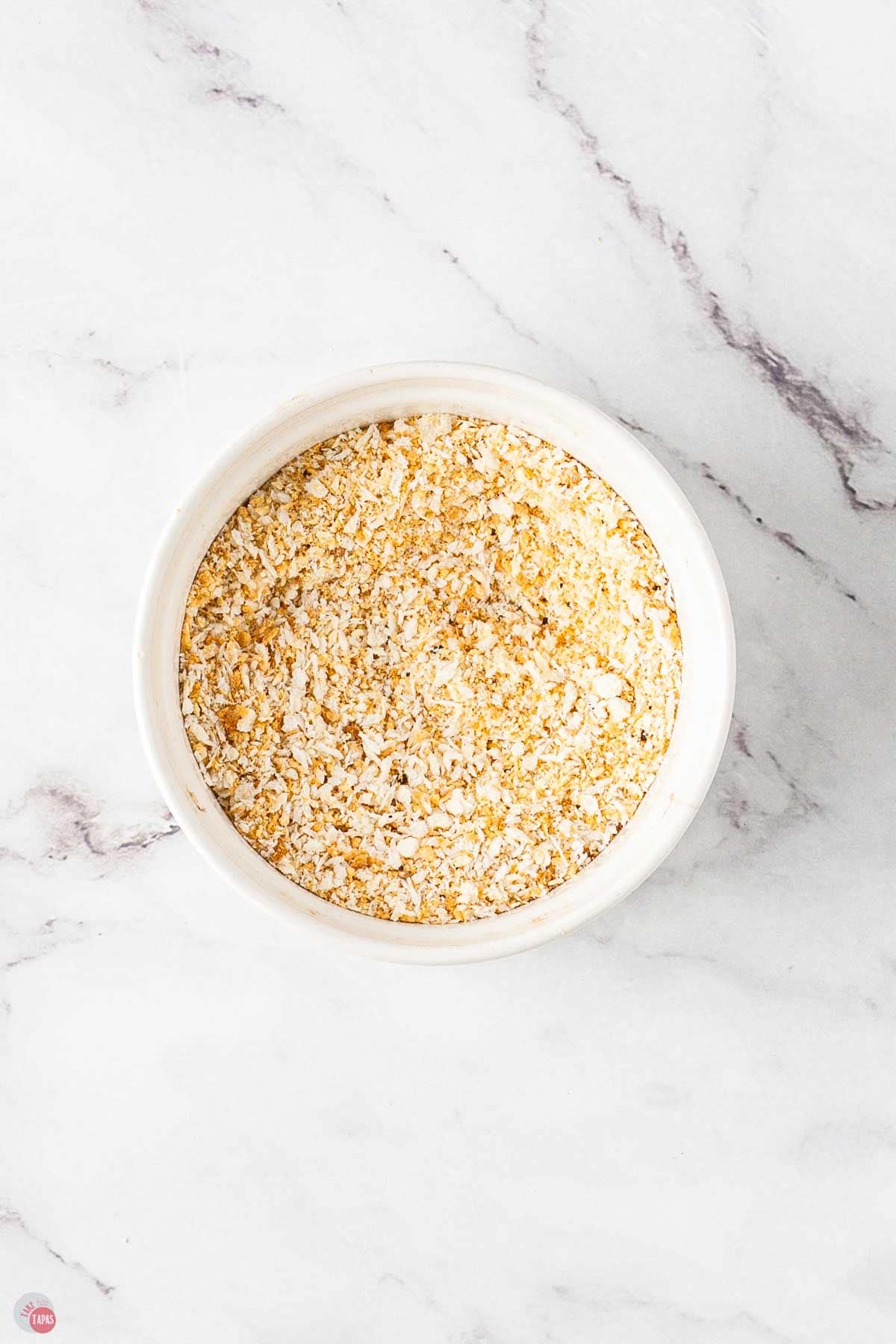 panko breadcrumb coating in a white mixing bowl