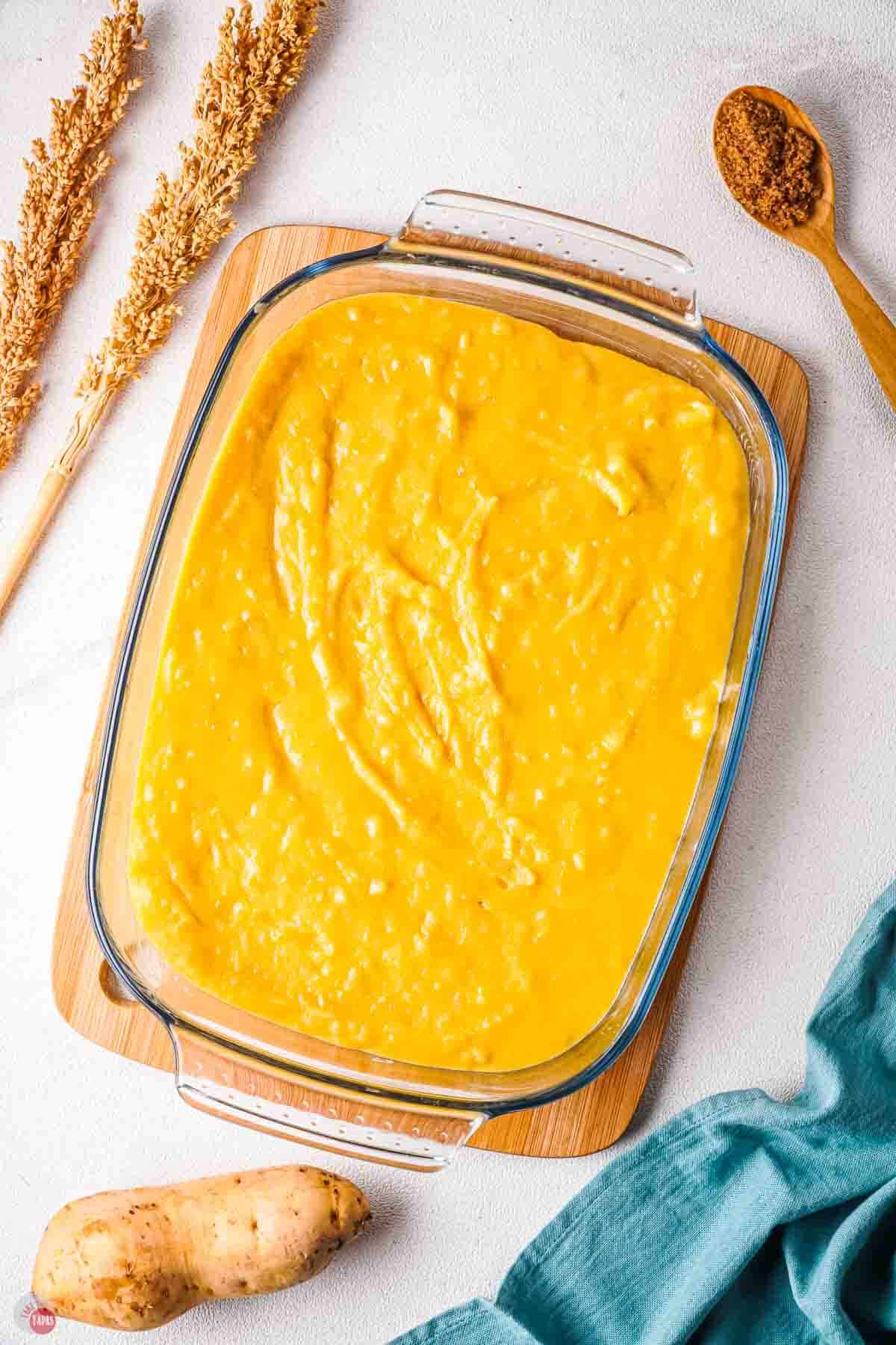 sweet potato mixture spread in a casserole dish