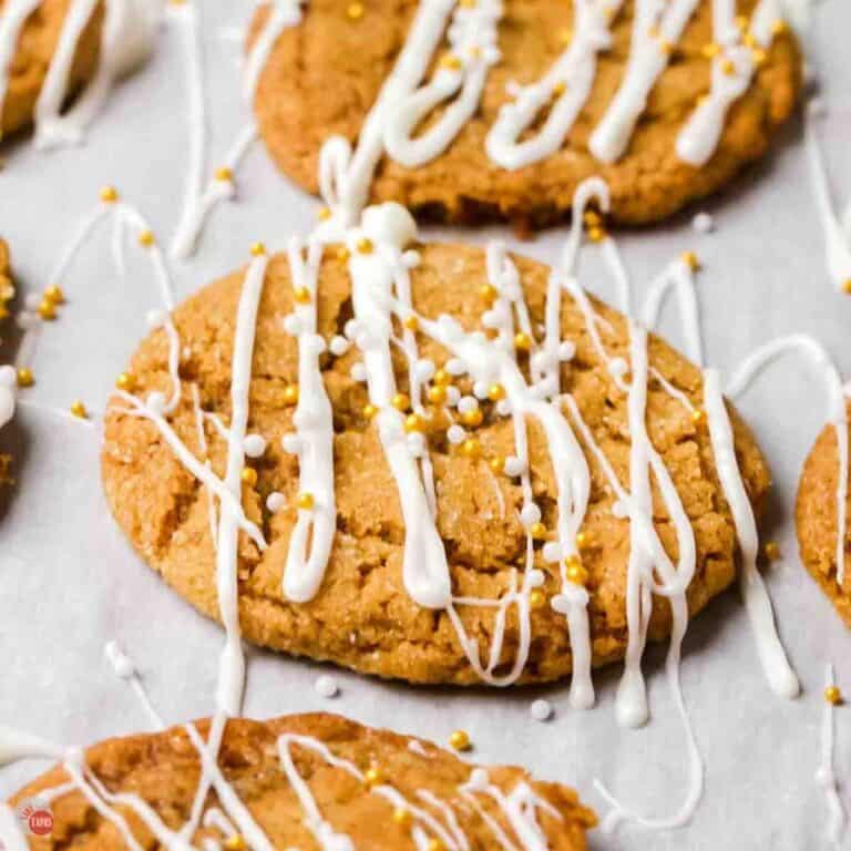 three cookies on a piece of parchment paper