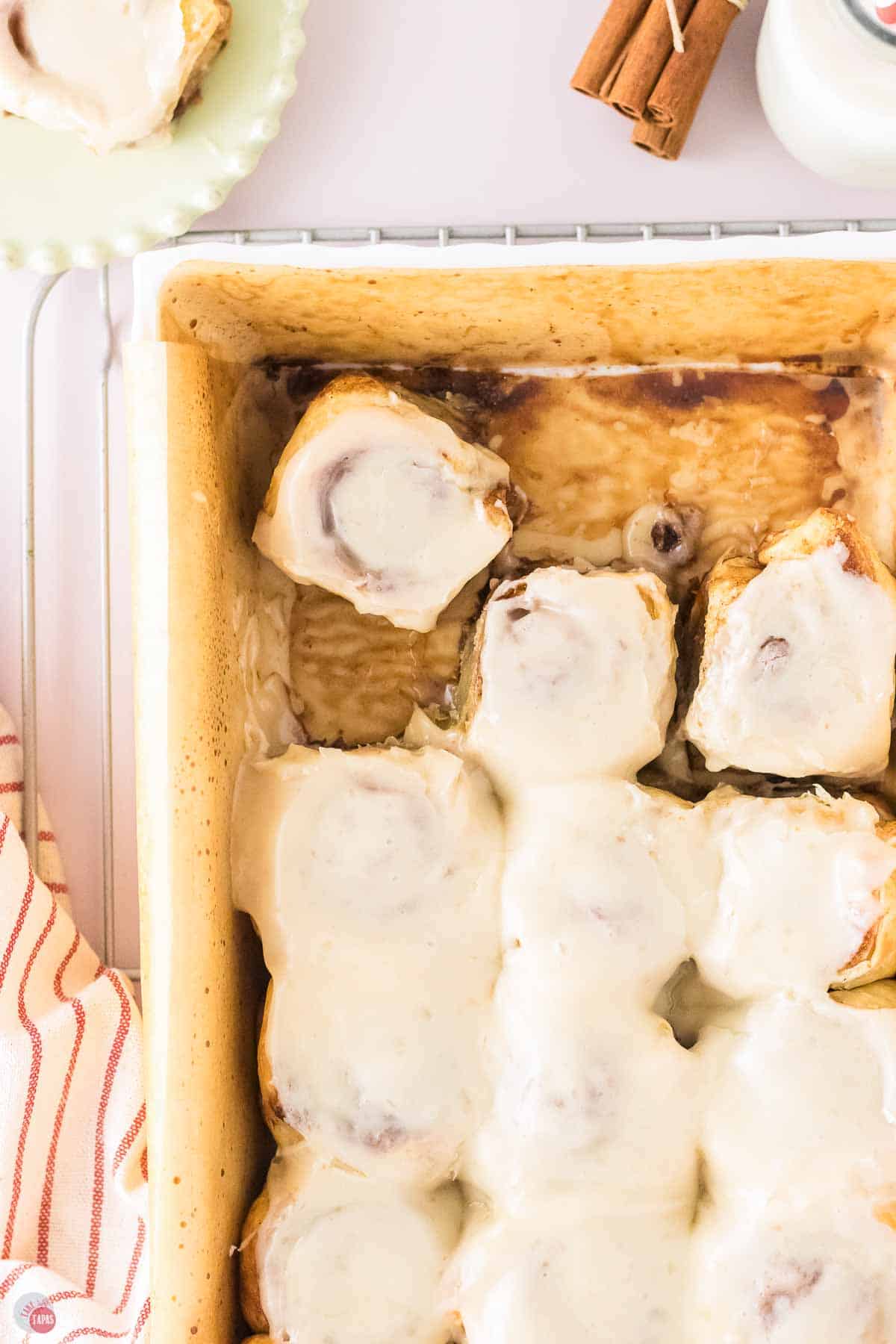 tray of cinnamon rolls with a few missing