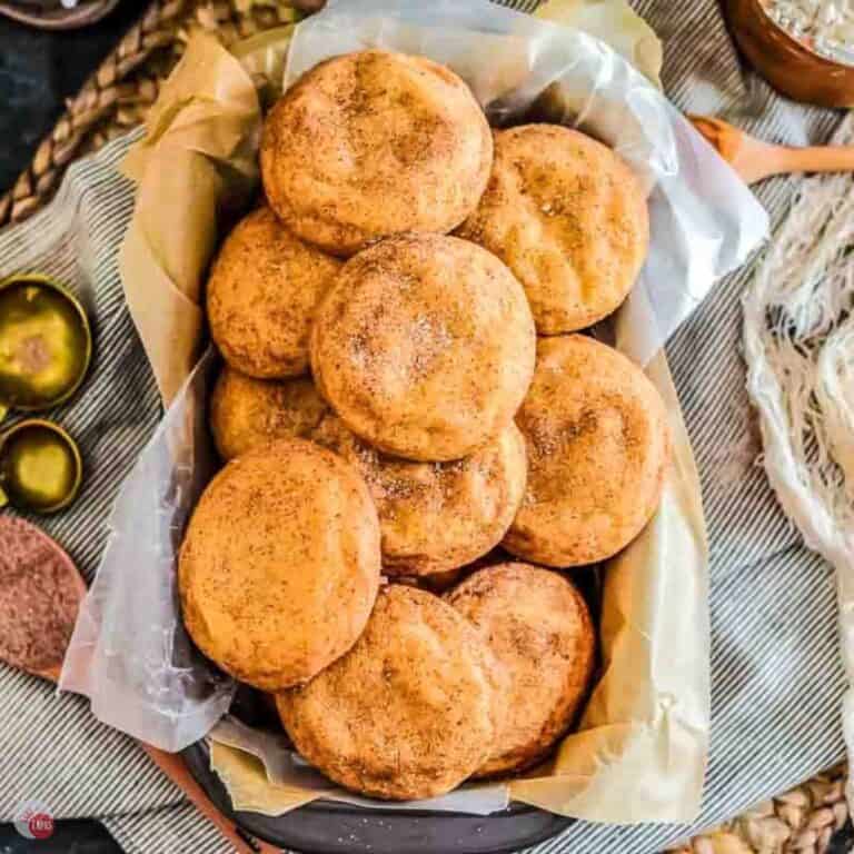 metal platter lined with parchment paper and full of snickerdoodles