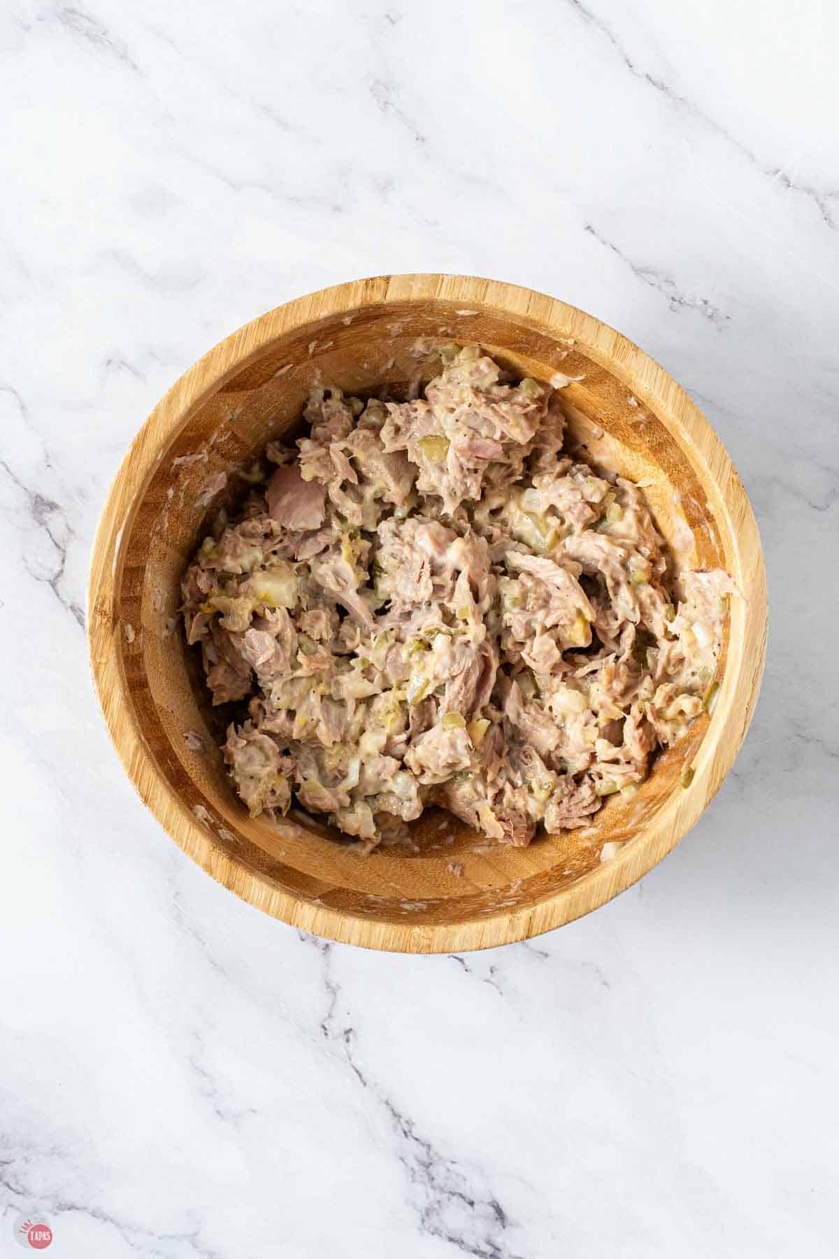 tuna salad in a wood mixing bowl