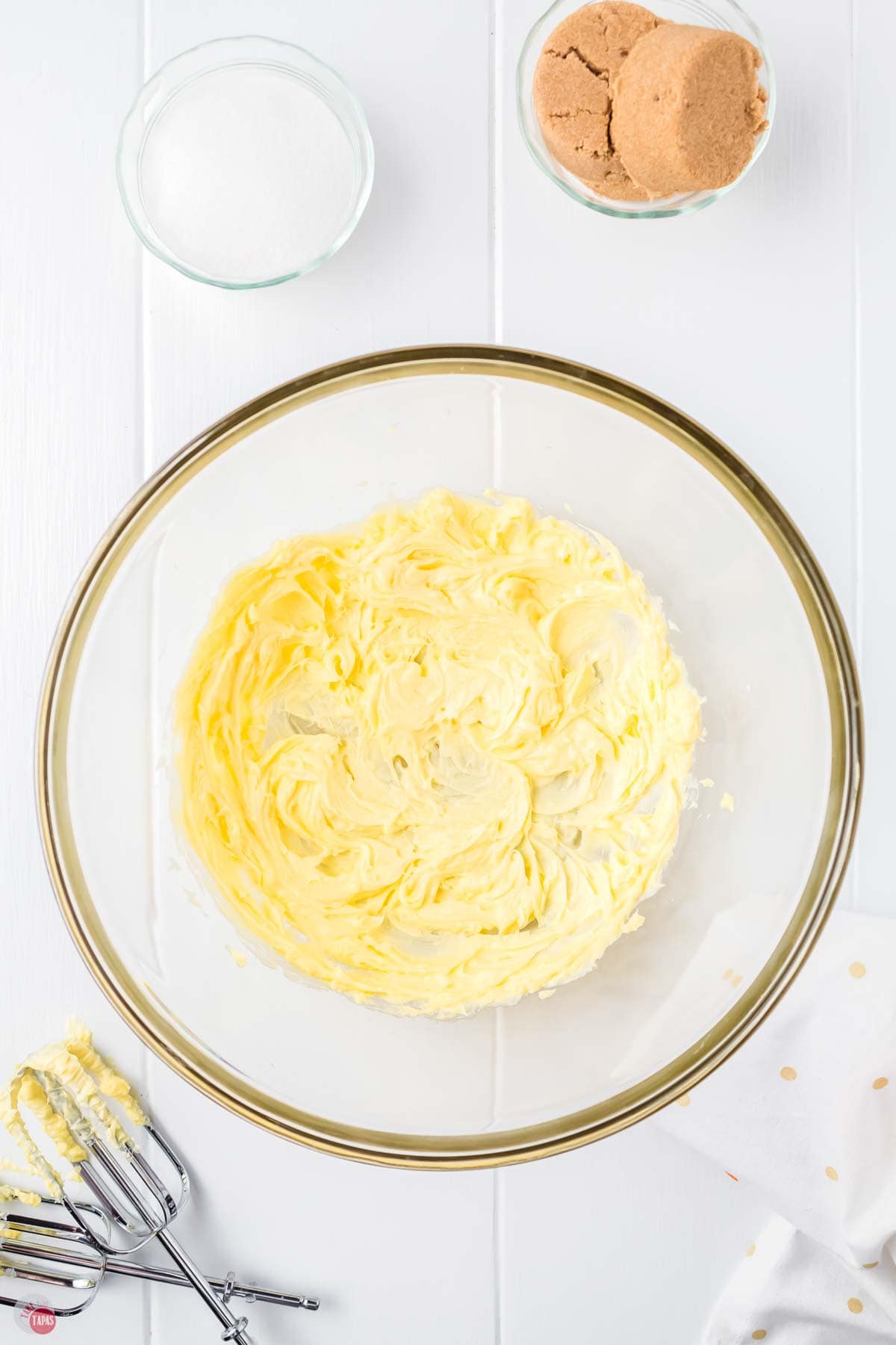 creamed butter in a clear mixing bowl