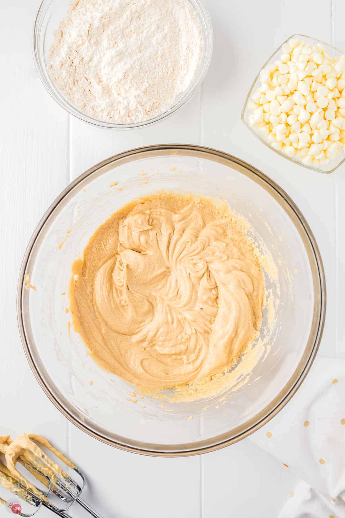 cookie dough in a clear mixing bowl