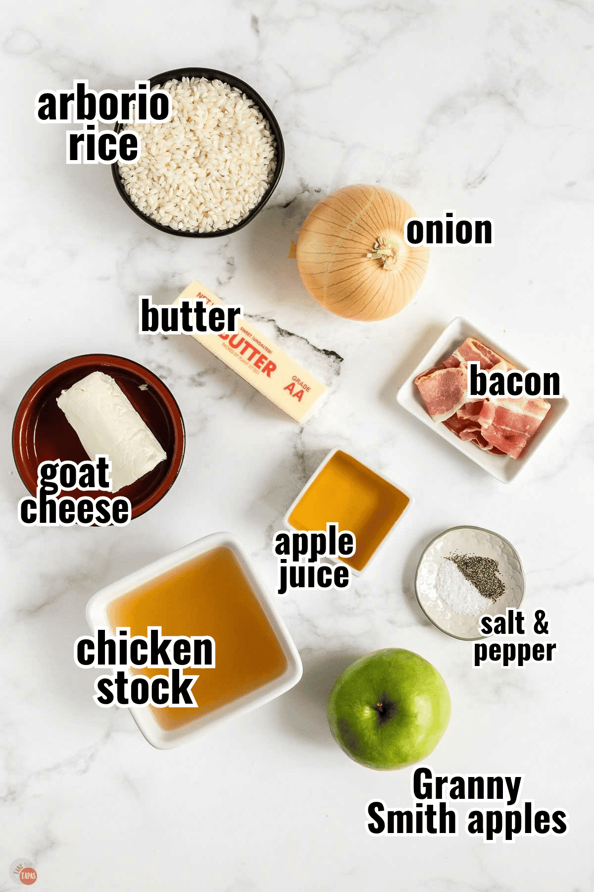 Labeled ingredients for apple risotto, including arborio rice, goat cheese, bacon and a Granny Smith apple