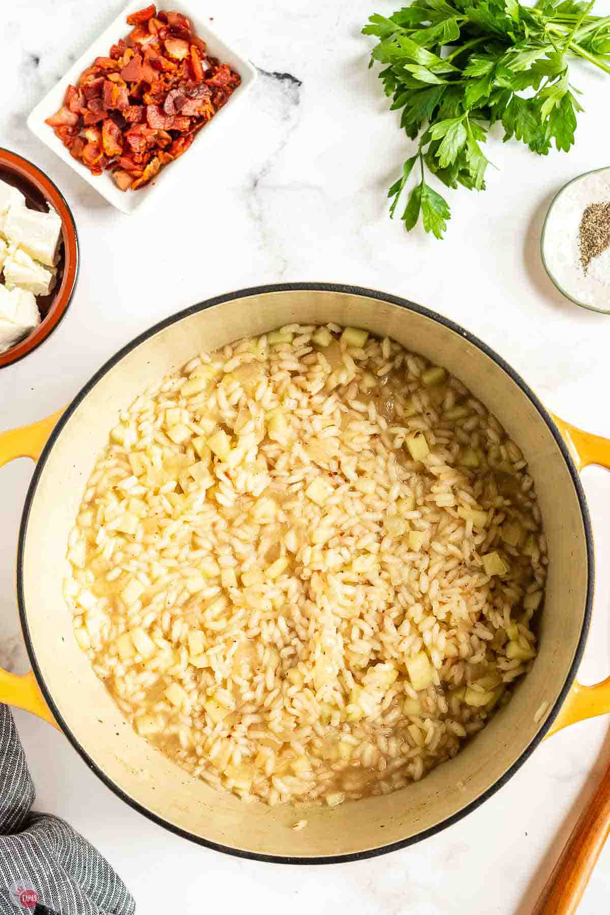 Apple risotto cooked until creamy in the pot