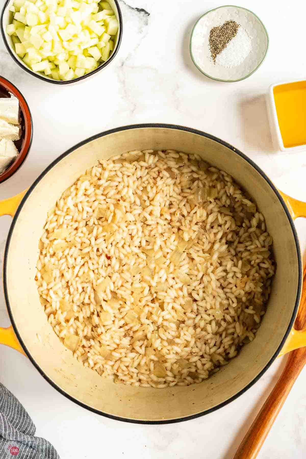 Toasted rice in the pot before the stock goes in