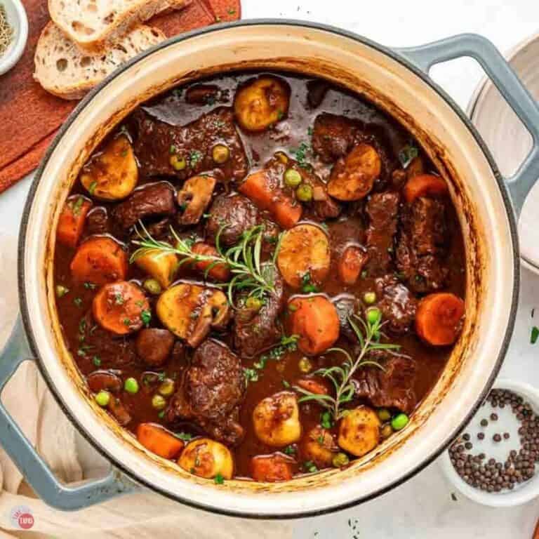 pot of beef stew with red wine and carrots