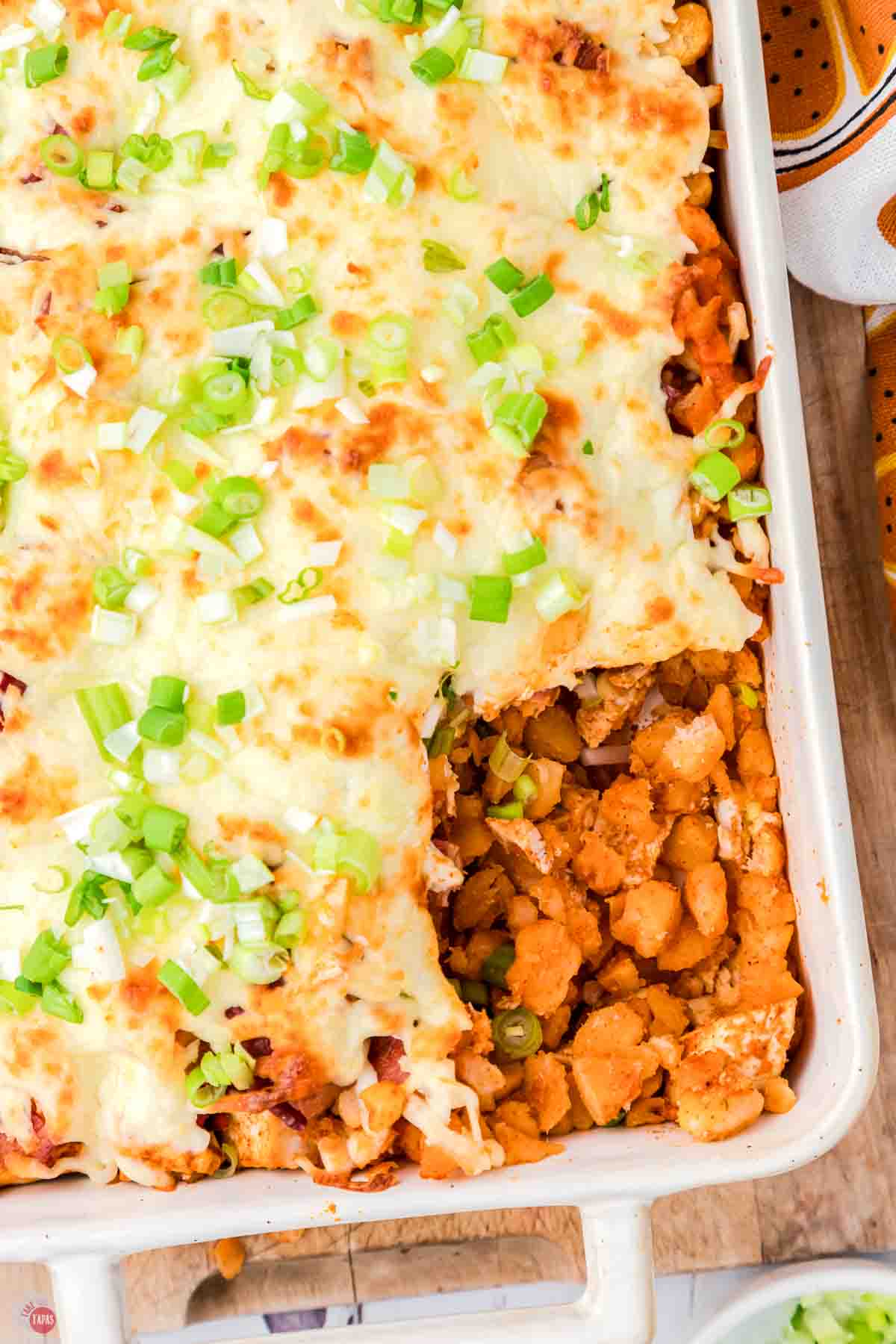 scoop of casserole missing out of a dish