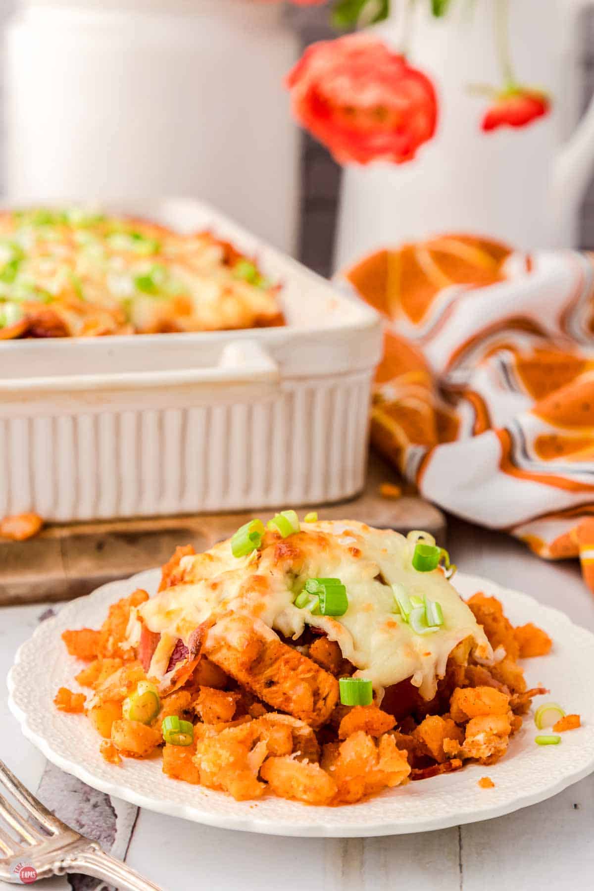 plate of chicken casserole with buffalo sauce and potatoes