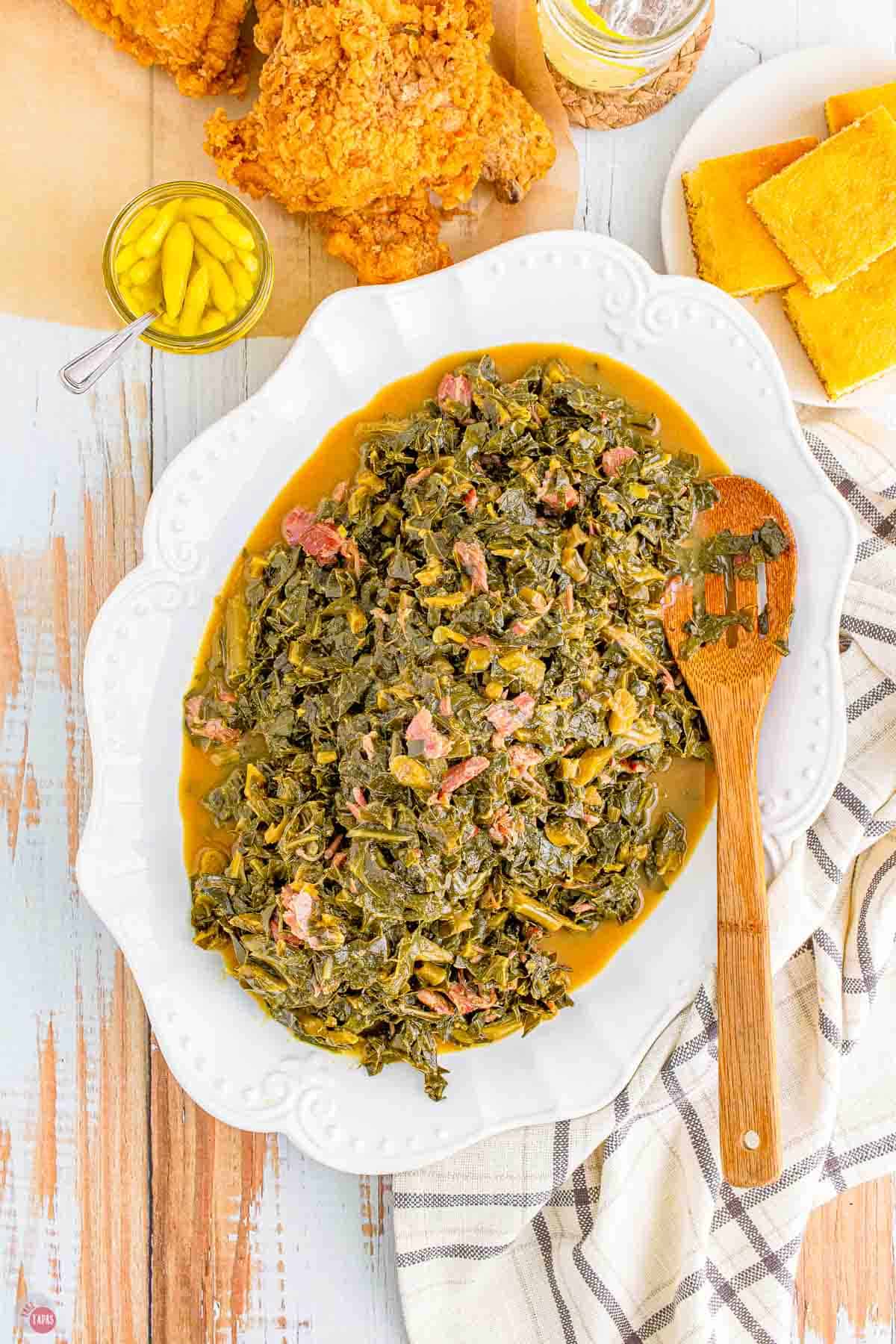 overhead platter of collard greens with ham